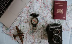 a compass and camera on a map